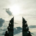 Silhouette of Pura Lempuyang's iconic gates with dramatic sky in Bali, Indonesia.