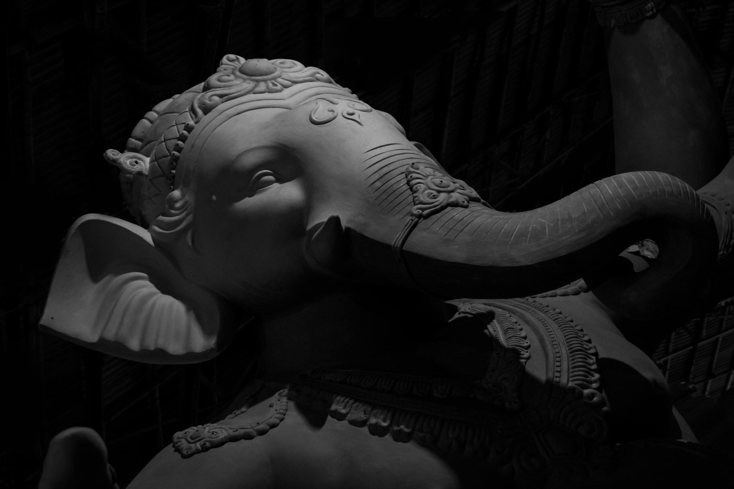 Close-up of a Ganesha sculpture in monochrome, highlighting intricate details. Shot in Mumbai.